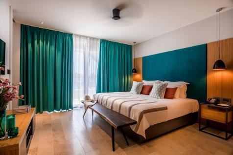 מלון מגדלה טבריה - מבט על חדר שינה בסוויטה